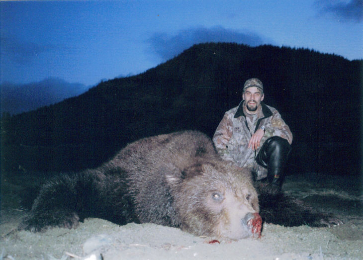 Mark Woodward with his big brown bear.